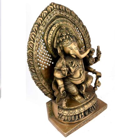 Brass Sitting Ganesha with Decorative Background