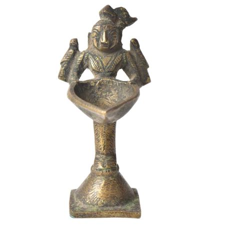 Brass Lady Holding A Diya In Her Hand On A Raised Platform