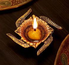 Decorative Metal Diyas In Swastika Shape Oil Lamp