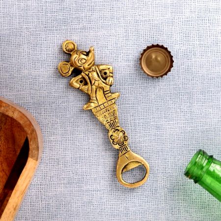 Brass Cartoon Character Bottle Opener On Tribal Floral Stand