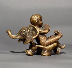 Vintage Brass Baby Riding Elephant Statue for Collection
